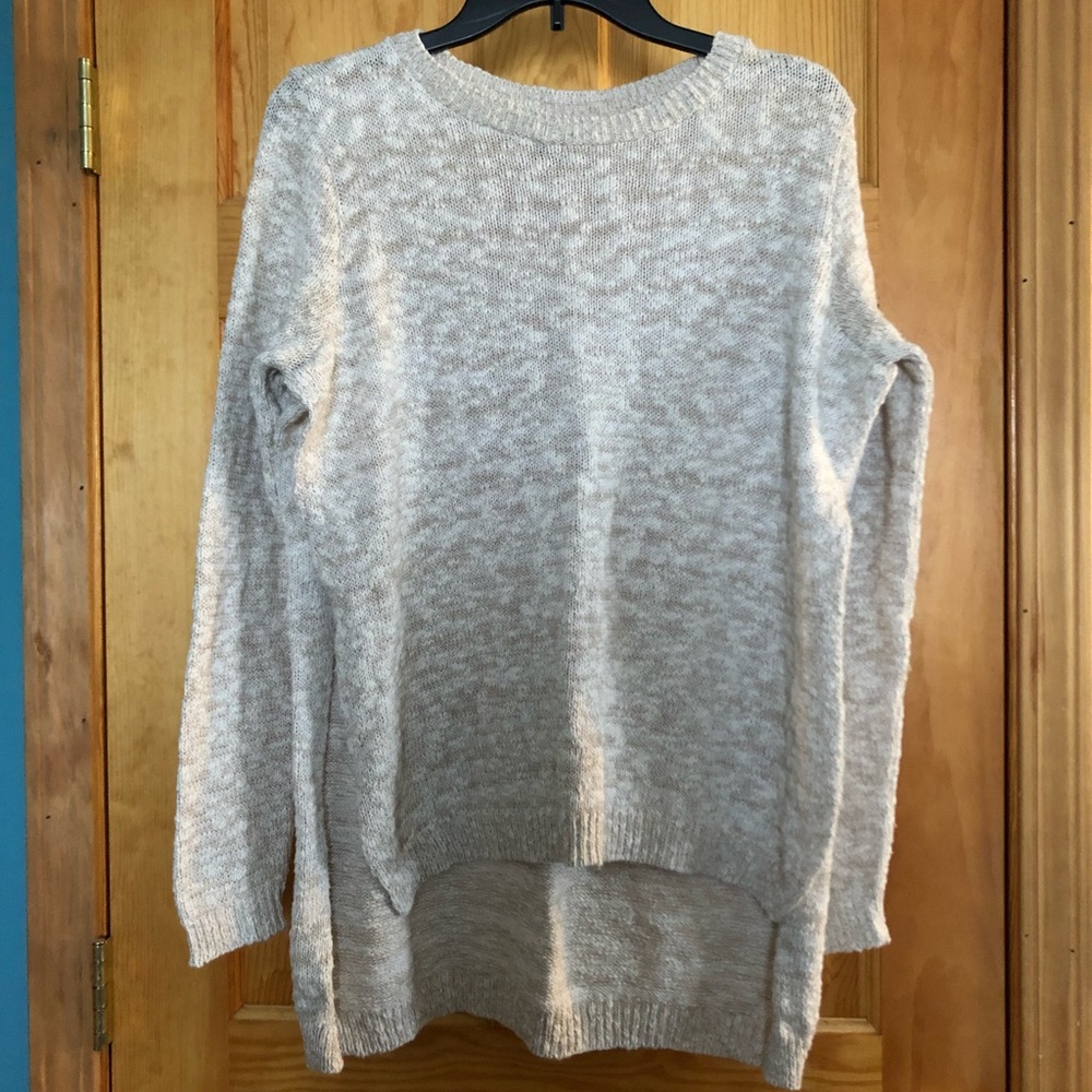 Cream colored hi-low extreme side slit sweater